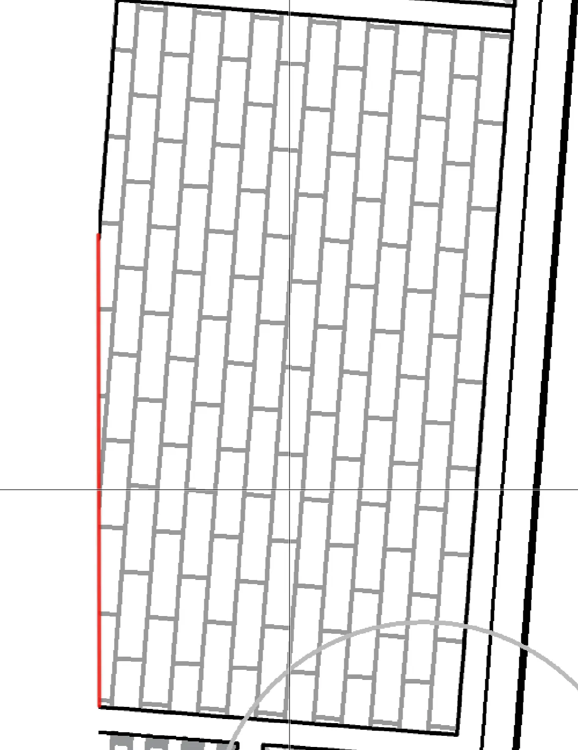 The same paved area with a manual border drawn as a red line down its open left side, bridging the full length where no boundary line exists
